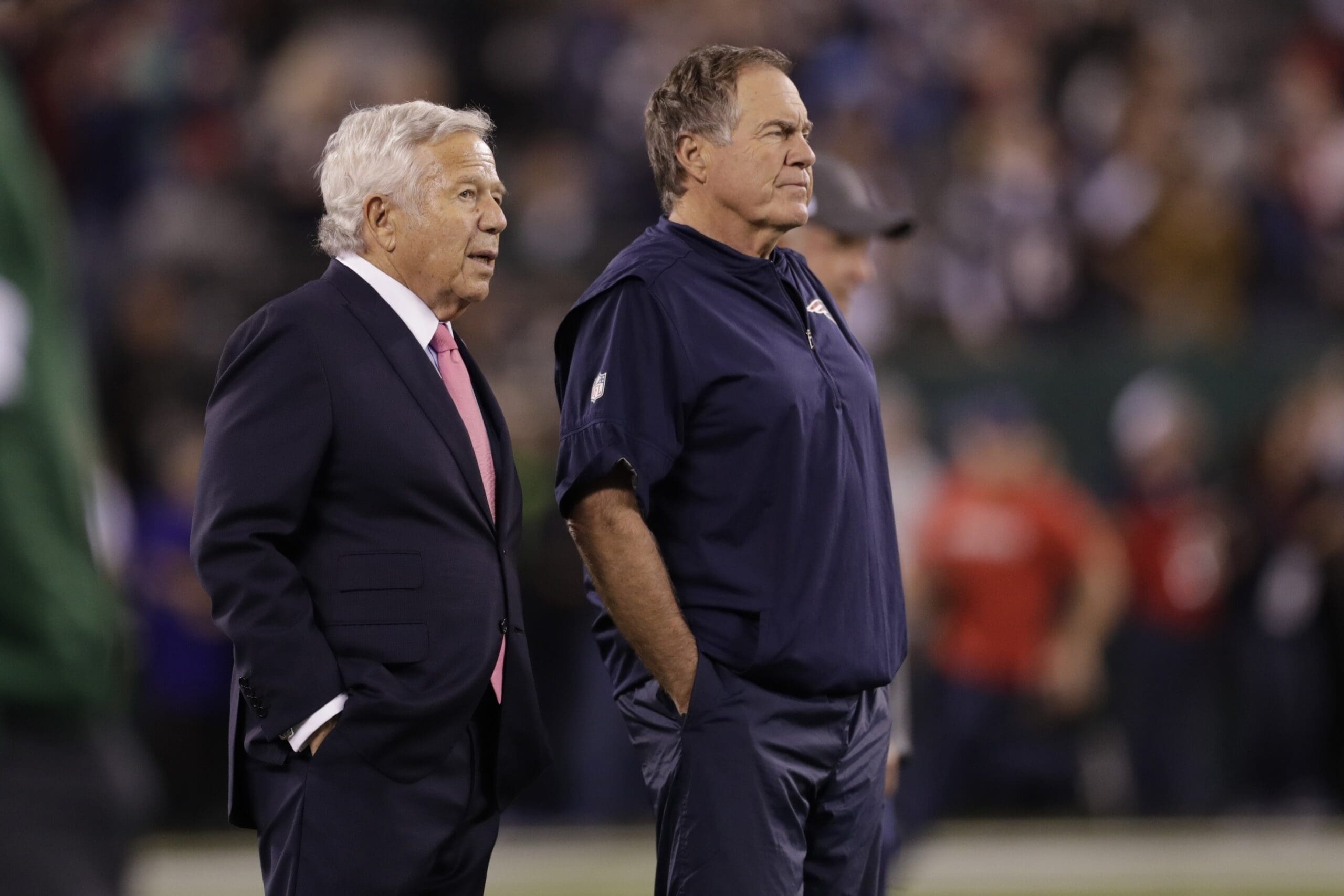 New England Patriots head coach Bill Parcells talks with