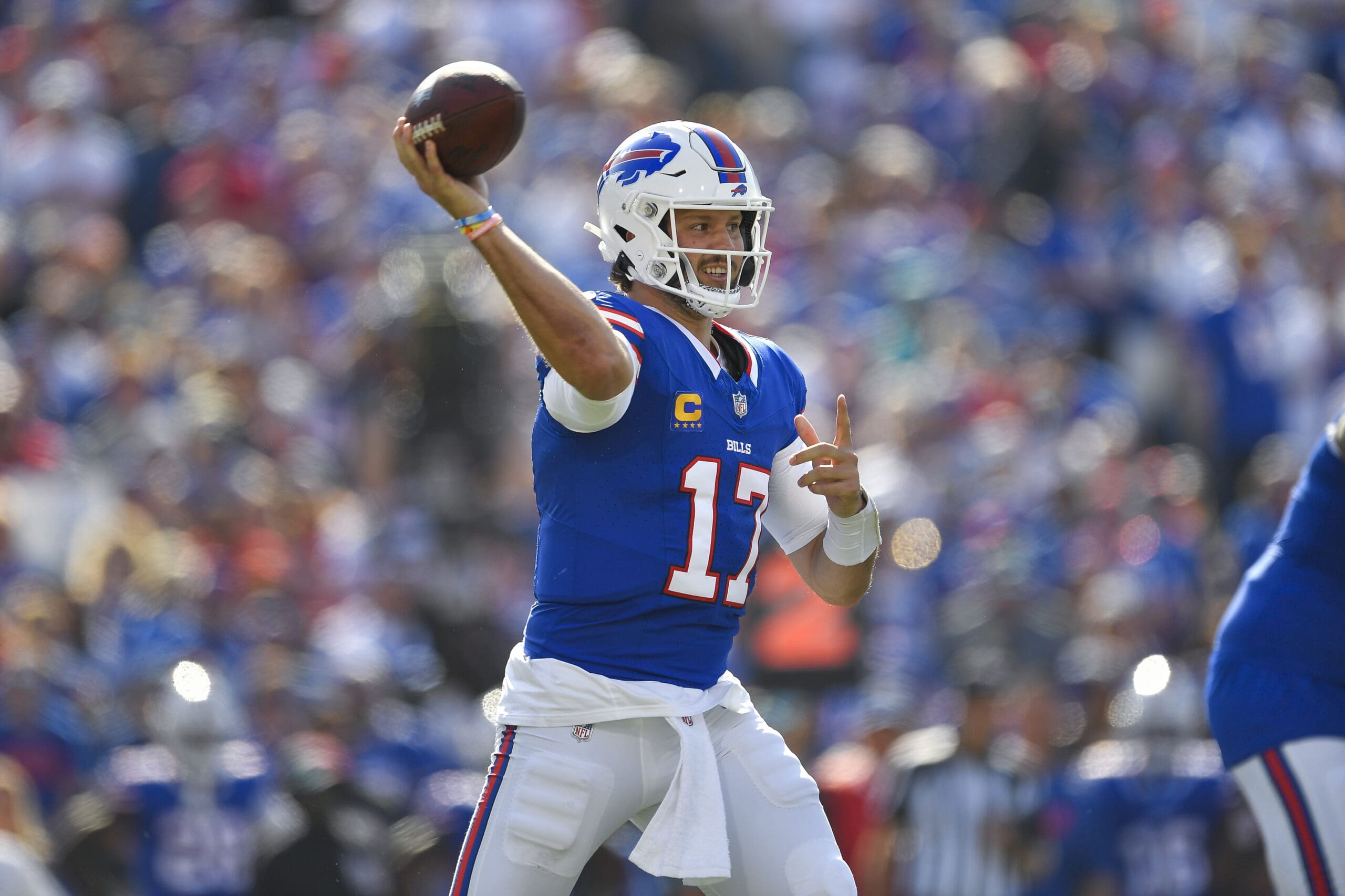Buffalo Bills quarterback Josh Allen (17) throws a pass during the second half of an NFL football game against the Miami Dolphins in Orchard Park, N.Y., Sunday, Oct. 1, 2023. Allen was selected for the perfect AFC East team, which included no New England Patriots representation. (AP Photo/Adrian Kraus)