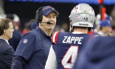New England Patriots offensive coordinator Bill O'Brien, left, talks to quarterback Bailey Zappe (4) during an NFL Football game in Arlington, Texas, Sunday, Nov. 1, 2023. (AP Photo/Michael Ainsworth)