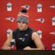 New England Patriots tight end Hunter Henry speaks during a press conference after an NFL football game against the Indianapolis Colts in Frankfurt, Germany Sunday, Nov. 12, 2023. The Colts won 10-6. (AP Photo/Martin Meissner)