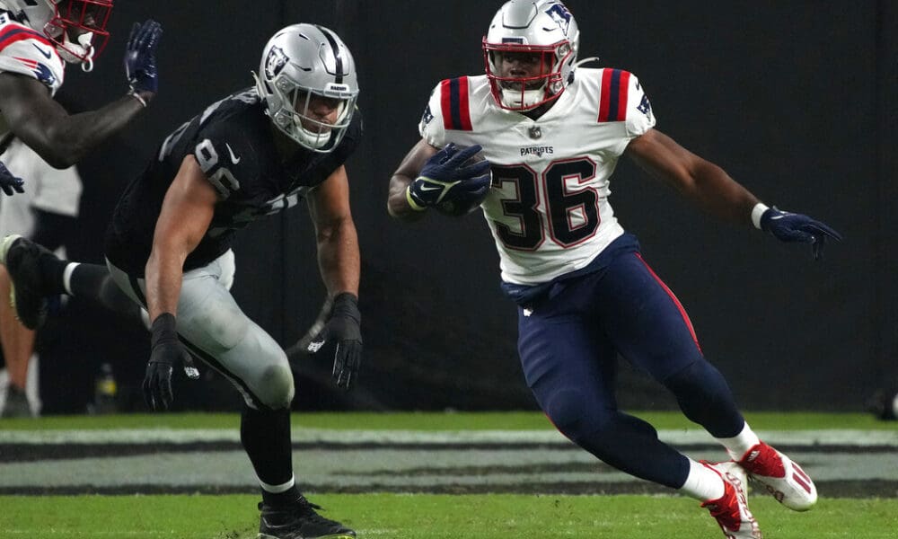 New England Patriots running back Kevin Harris (36) runs the ball against the Las Vegas Raiders during the first half of an NFL preseason football game, Friday, Aug. 26, 2022, in Las Vegas. (AP Photo/Rick Scuteri)