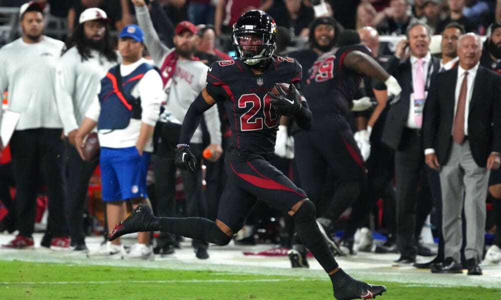 Arizona Cardinals cornerback Marco Wilson (20) scores a touchdown after intercepting the ball against the New Orleans Saints during the first half of an NFL football game, Thursday, Oct. 20, 2022, in Glendale, Ariz. (AP Photo/Rick Scuteri)