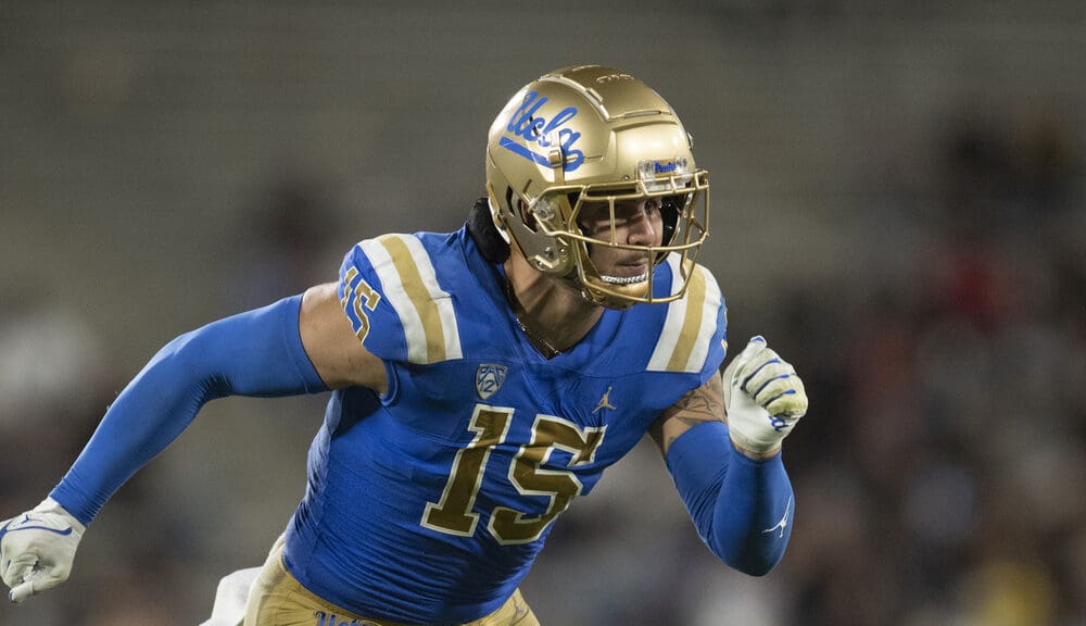 UCLA defensive lineman Laiatu Latu (15) runs during an NCAA football game against Coastal Carolina on Saturday, Sept. 2, 2023, in Los Angeles. Latu is the premier edge defender in the 2024 NFL Draft the New England Patriots will be scouting. (AP Photo/Kyusung Gong)
