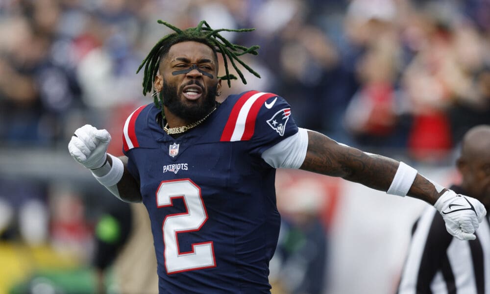 New England Patriots cornerback Jalen Mills (2) gestures while warming up prior to an NFL football game against the Washington Commanders, Sunday, Nov. 5, 2023, in Foxborough, Mass. Mills was Pro Football Focus highest graded defensive player for Week 14 (AP Photo/Michael Dwyer)