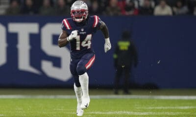 New England Patriots wide receiver Ty Montgomery II (14) runs up the field during an NFL football game between the New England Patriots and the Indianapolis Colts at Deutsche Bank Park Stadium in Frankfurt, Germany, Sunday, Nov. 12, 2023. (AP Photo/Steve Luciano)