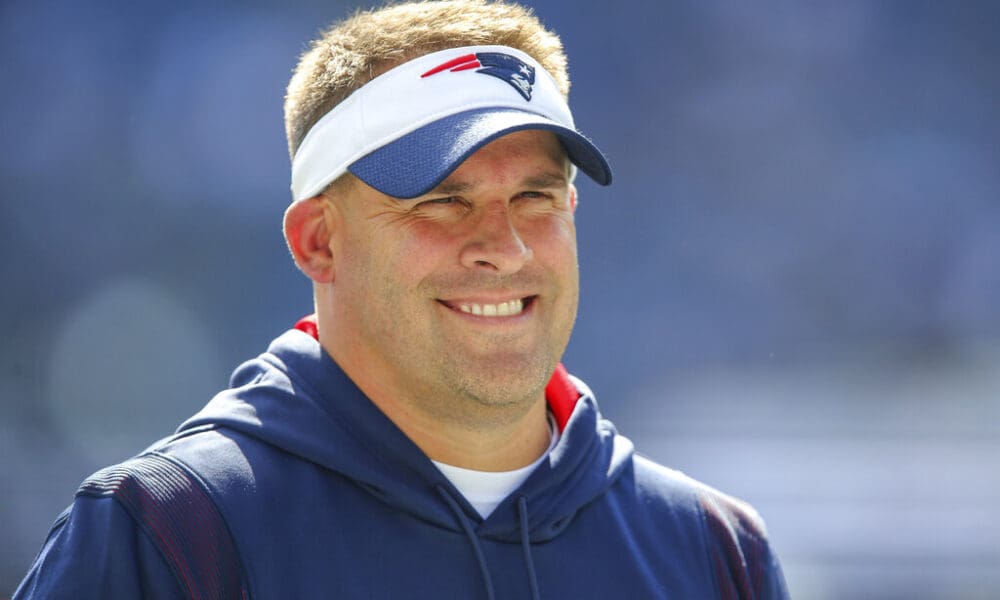 New England Patriots offensive coordinator Josh McDaniels on the field prior to an NFL football game against the New Orleans Saints, Sunday, Sept. 26, 2021, in Foxborough, Mass. (AP Photo/Stew Milne)