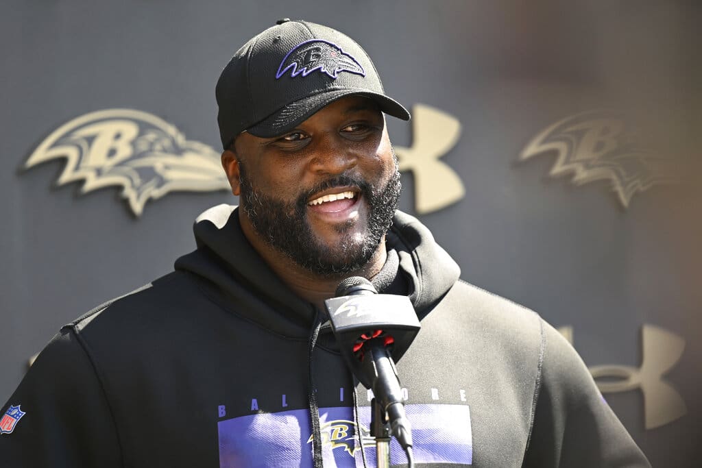 Baltimore Ravens Wide receiver coach Tee Martin answers questions from the media after an NFL football team practice, Wednesday, June 15, 2022, in Owings Mills, Md. Martin is rumored to be a candidate for the New England Patriots offensive coordinator job. (AP Photo/Gail Burton)