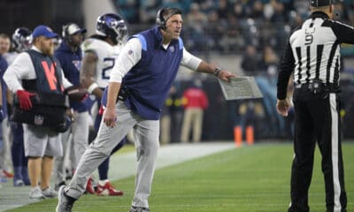 Tennessee Titans head coach Mike Vrabel argues with line judge Mark Perlman (9) during the second half of an NFL football game against the Jacksonville Jaguars, Saturday, Jan. 7, 2023, in Jacksonville, Fla. (AP Photo/Phelan M. Ebenhack)