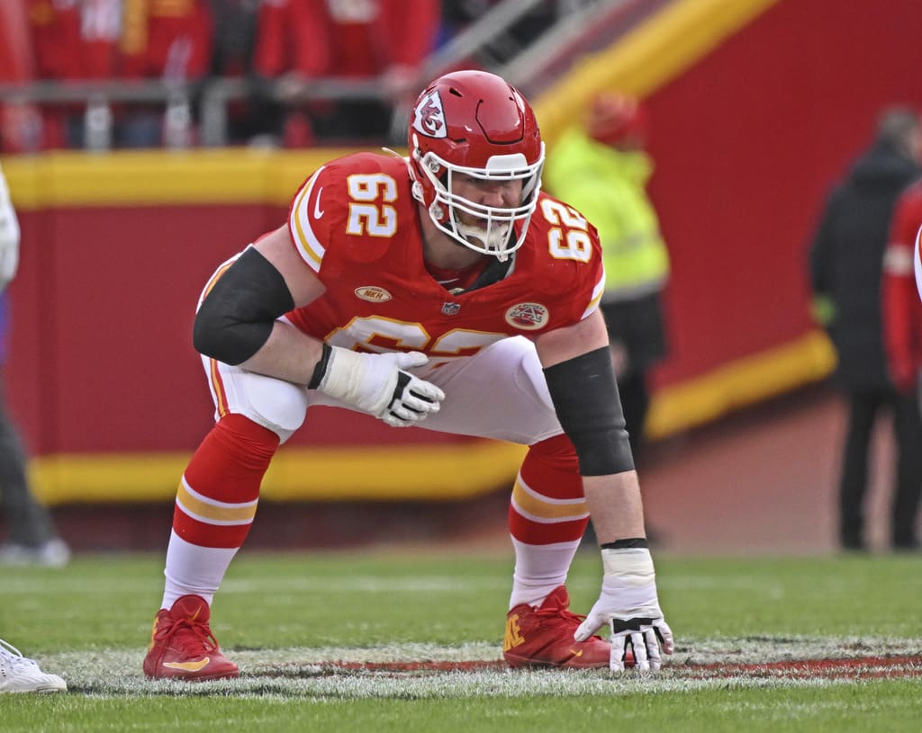 Former New England Patriots player, now with the Kansas City Chiefs guard Joe Thuney (62) gets set on the line before a play during an NFL football game against the Buffalo Bills Sunday, Dec. 10, 2023, in Kansas City, Mo. (AP Photo/Peter Aiken)