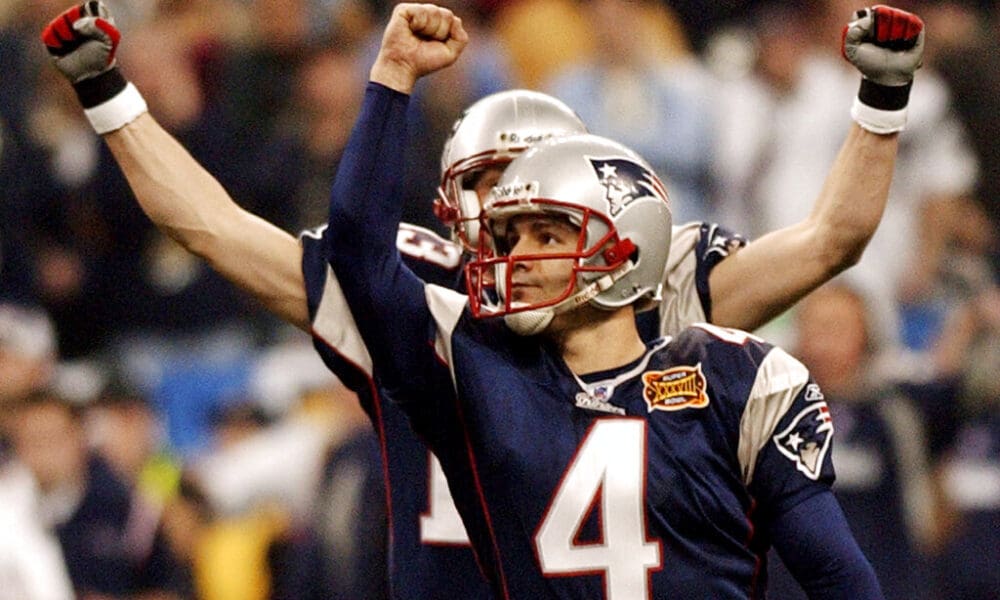 FILE - In this Feb. 1, 2004, file photo, New England Patriots kicker Adam Vinatieri celebrates his game-winning field goal with teammate Ken Walter, rear, during the final seconds of their 32-29 victory over the Carolina Panthers in Super Bowl XXXVIII on Sunday, Feb. 1, 2004, at Reliant Stadium in Houston. The Patriots won 32-29. Vinatieri is one of the finalists for the Pro Football Hall of Fame Class of 2025. (AP Photo/Dave Martin, File)