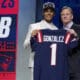 Oregon defensive back Christian Gonzalez, left, poses with NFL Commissioner Roger Goodell after being chosen by the New England Patriots with the 17th overall pick during the first round of the NFL football draft, Thursday, April 27, 2023, in Kansas City, Mo. (AP Photo/Jeff Roberson)