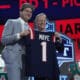 North Carolina quarterback Drake Maye poses with NFL commissioner Roger Goodell after being chosen by the New England Patriots with the third overall pick during the first round of the NFL Draft, Thursday, April 25, 2024, in Detroit. (AP Photo/Jeff Roberson)