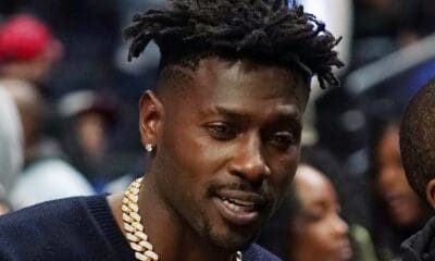 FILE - Former New England Patriots player Antonio Brown watches an NBA basketball game between the Los Angeles Clippers and the Golden State Warriors, Monday, Feb. 14, 2022, in Los Angeles. No charges will be filed against Antonio Brown following an apparent domestic incident at a Tampa, Florida, home in late November, prosecutors said Wednesday, Dec. 21, 2022. (AP Photo/Mark J. Terrill, File)