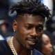 FILE - Former New England Patriots player Antonio Brown watches an NBA basketball game between the Los Angeles Clippers and the Golden State Warriors, Monday, Feb. 14, 2022, in Los Angeles. No charges will be filed against Antonio Brown following an apparent domestic incident at a Tampa, Florida, home in late November, prosecutors said Wednesday, Dec. 21, 2022. (AP Photo/Mark J. Terrill, File)