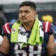 New England Patriots guard Atonio Mafi (68) stands on the sideline during an NFL football game against the New York Jets on Sunday Sept. 24, 2023, in New York. (AP Photo/Bryan Woolston)