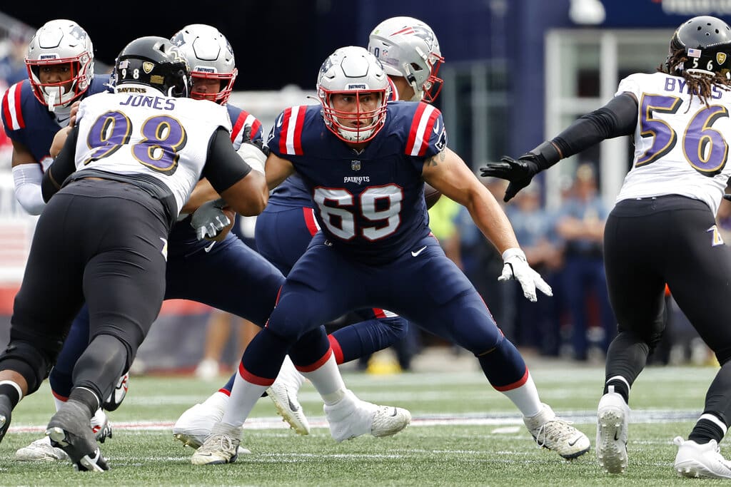 New England Patriots guard Cole Strange blocks against the Baltimore Ravens during an NFL football game at Gillette Stadium, Sunday, Sunday, Sept. 24, 2022 in Foxborough, Mass. (Winslow Townson/AP Images for Panini)